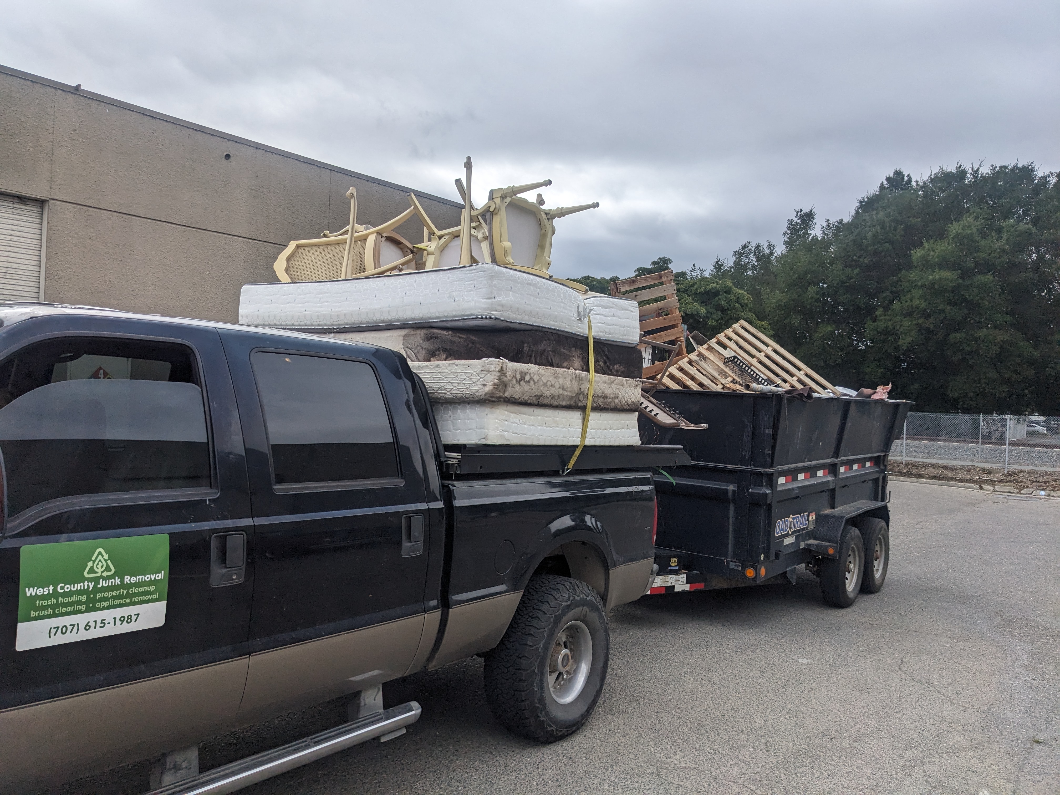 My truck, with trash on it, and a full trailer